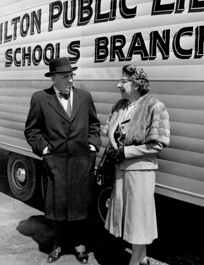 History of the Bookmobile Archival photo of Mayor Lloyd D. Jackson and Freda Waldon, Chief Librarian standing next to the Bookmobile in 1961